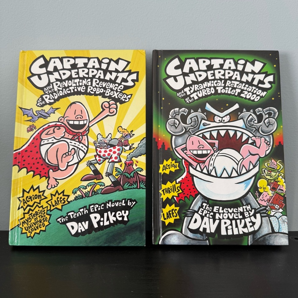 2 Captain Underpants hardcover books by Dav Pilkey. Tyrannical Revolting Revenge